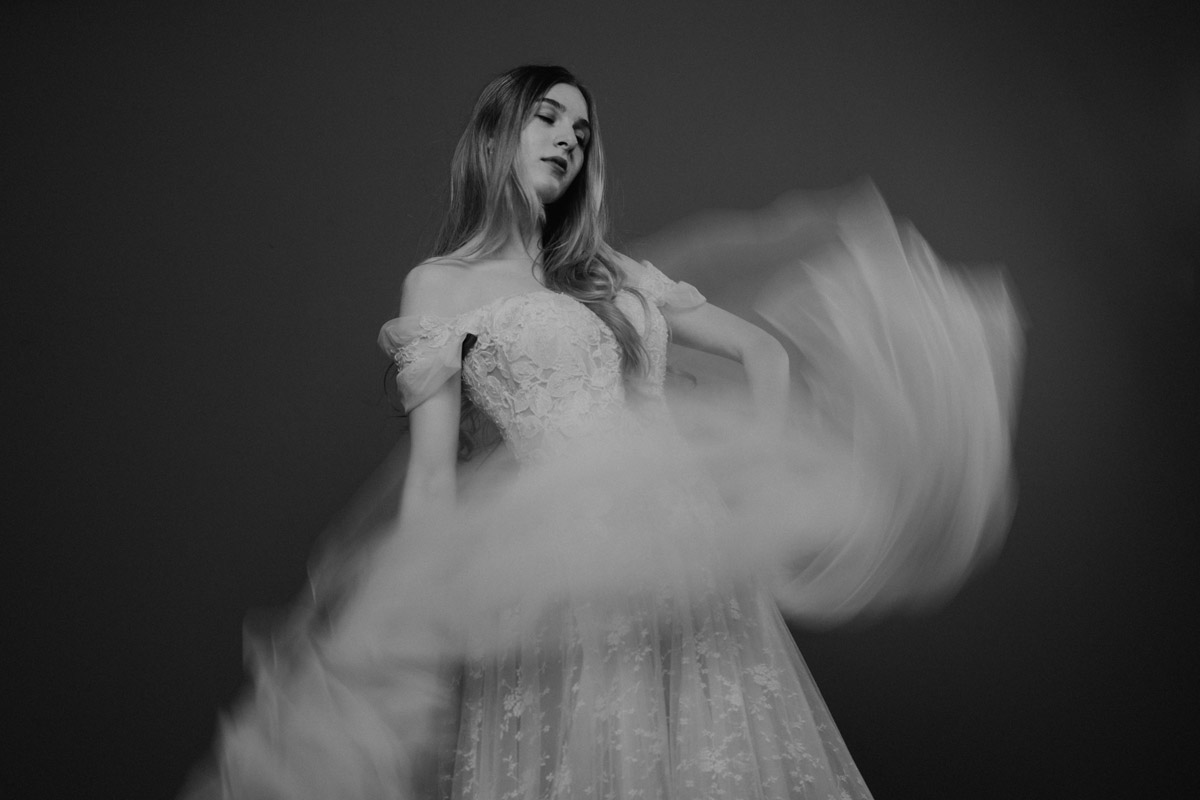 bride waving veil photographed by wedding fashion photographer berlin