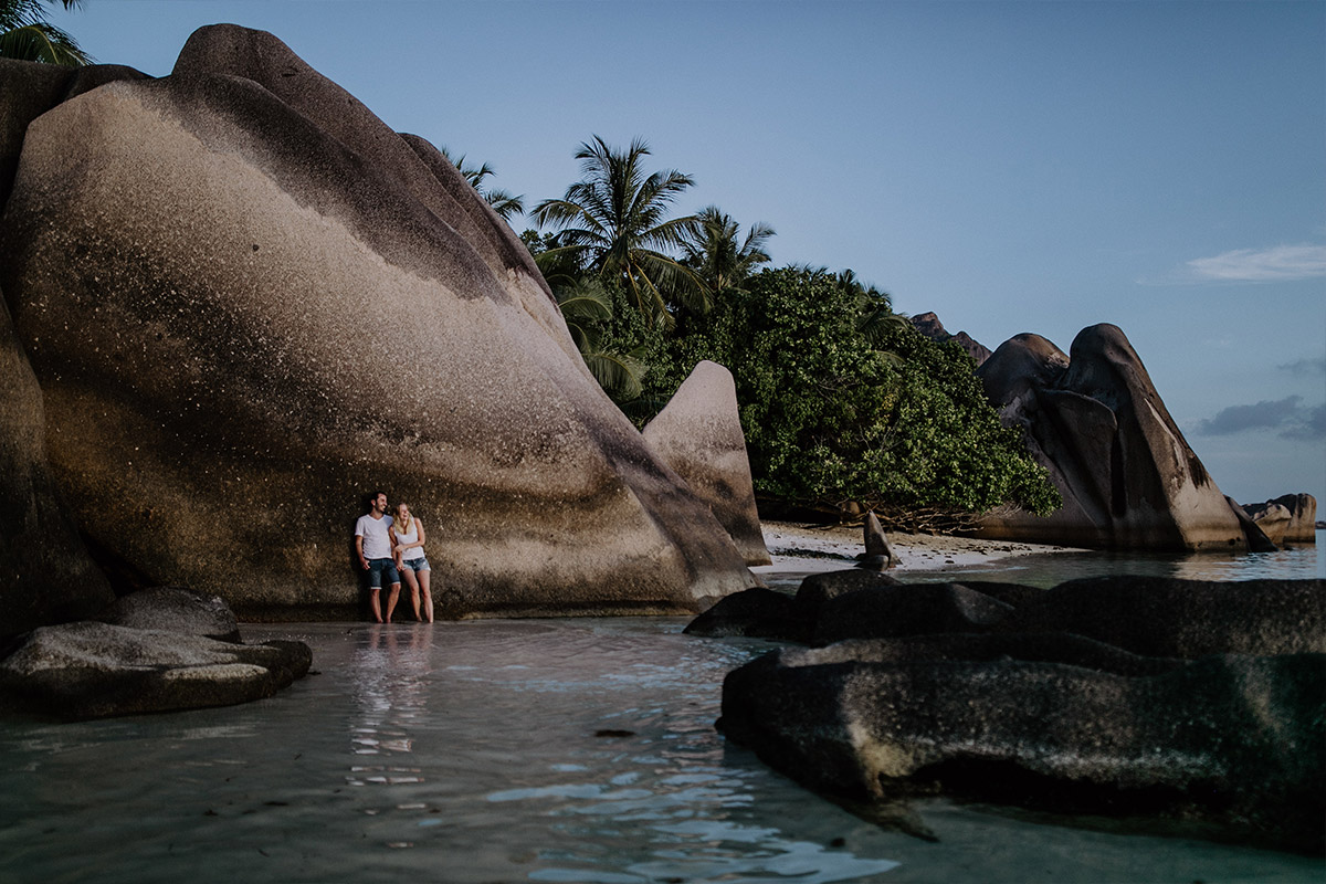 destination photographer joins couple in the Seychelles for an authentic pre-wedding photo shoot on the beach